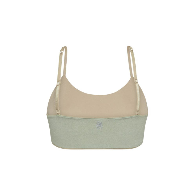 Close-up view of back of green Bleum Active Bra with crisscross straps