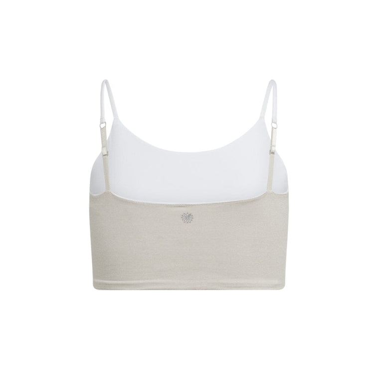 Back view of a beige crop top with white adjustable straps, displaying a small logo in the center.