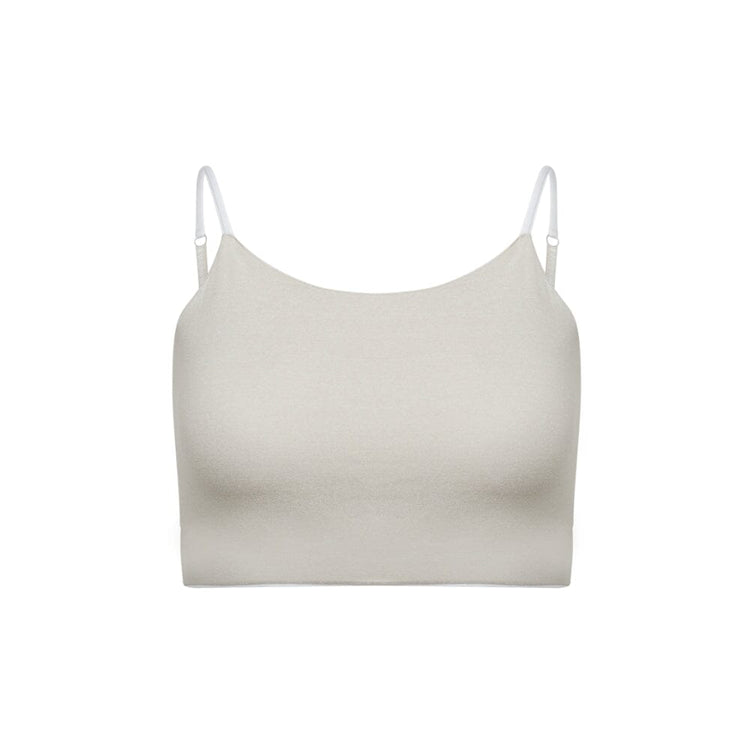 Beige crop top with white adjustable straps.