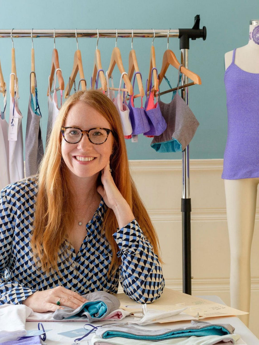 Bluet CEO & Co-Founder Elizabeth Rietz sitting in her office designing Bleuet girls first bras and teen bras