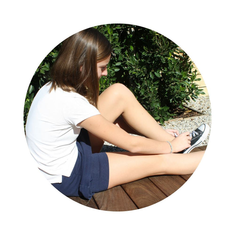 Girl wearing Bleumer tumble shorts