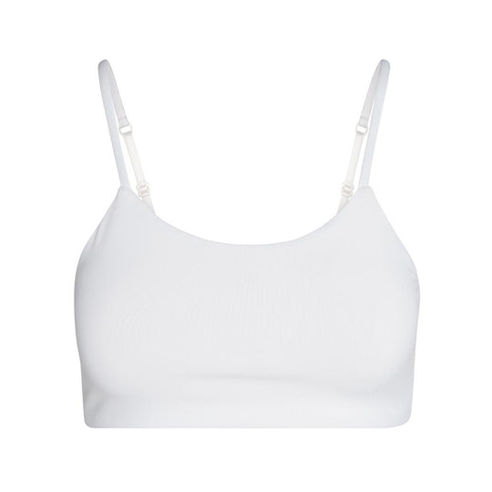 White#A white bra with adjustable straps, shown from the front.