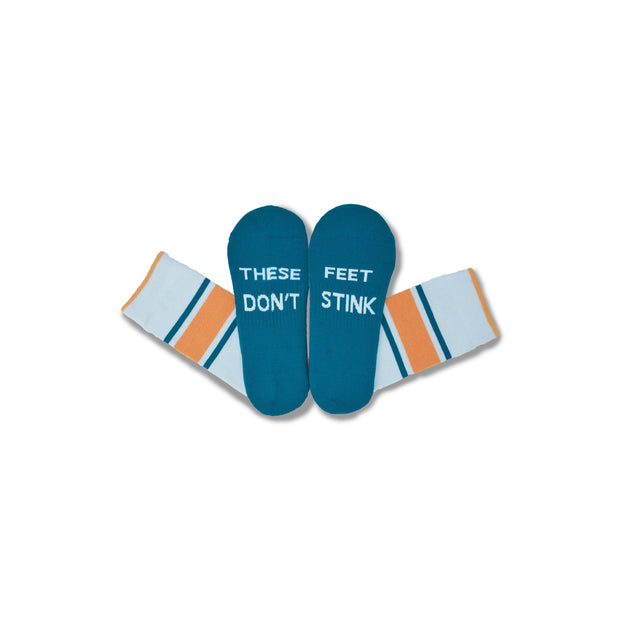 Light Blue#A pair of novelty socks with teal foot-shaped tops that read 'THESE FEET DON'T STINK' in white text, and cuffs in white with orange and teal stripes, shown on a plain white background.
