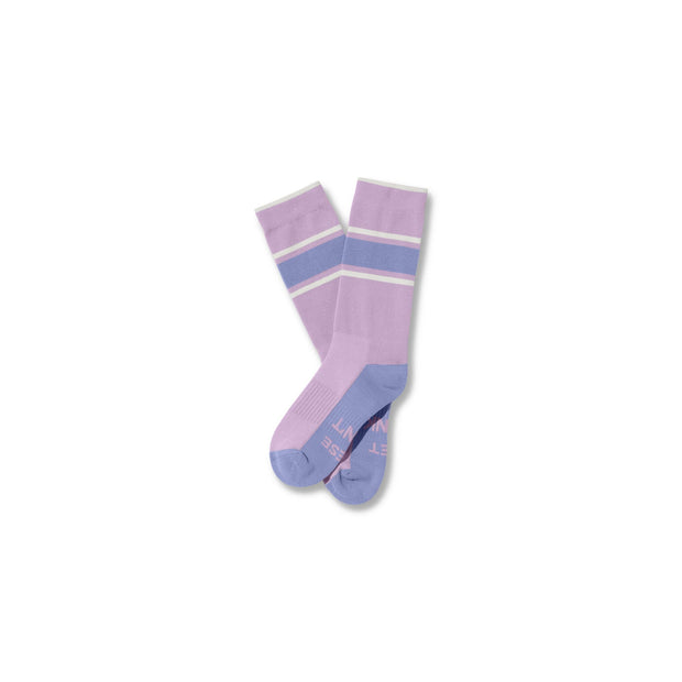 Lilac#A pair of knee-high athletic socks in lavender and light blue, featuring horizontal stripes near the cuff and a ribbed texture, displayed against a plain white background.