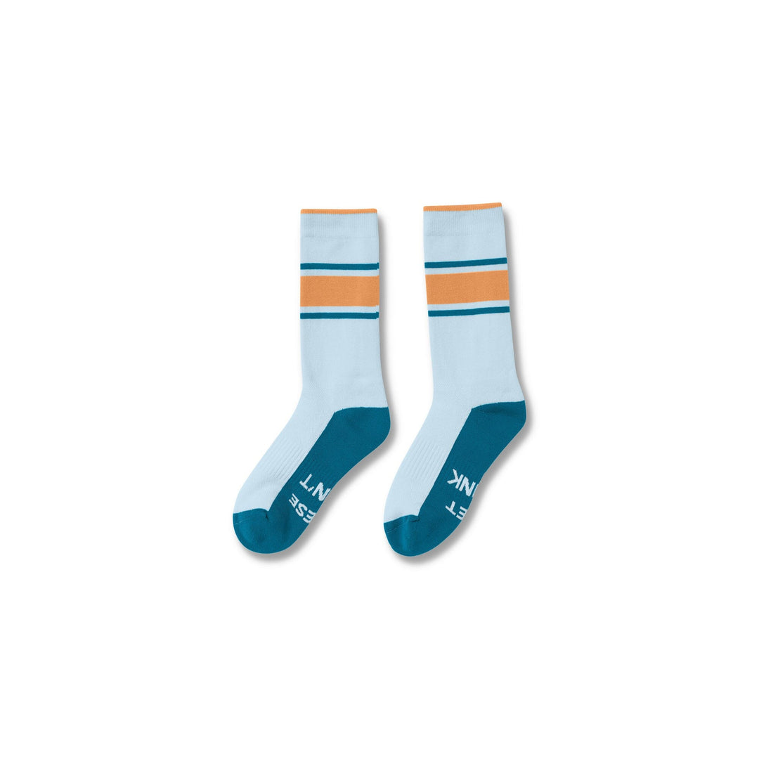 Light Blue#A pair of crew socks with a light blue body, teal toe and heel sections, and orange and dark teal stripes near the cuff. The word 'INK' is printed in white on the sole of one sock.
