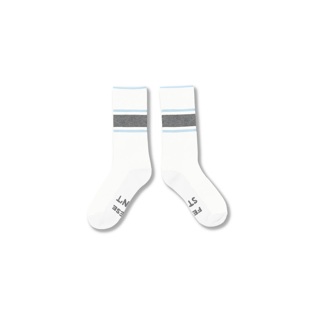 White#A pair of white crew socks with a gray horizontal stripe and thin light blue accent stripes near the cuff, displayed on a clean white background.