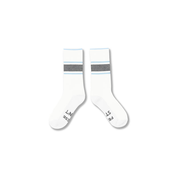 White#A pair of white crew socks with a gray horizontal stripe and thin light blue accent stripes near the cuff, displayed on a clean white background.