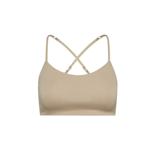 Sand-Sherbert#Close-up view beige Bleum Active Bra with crisscross straps