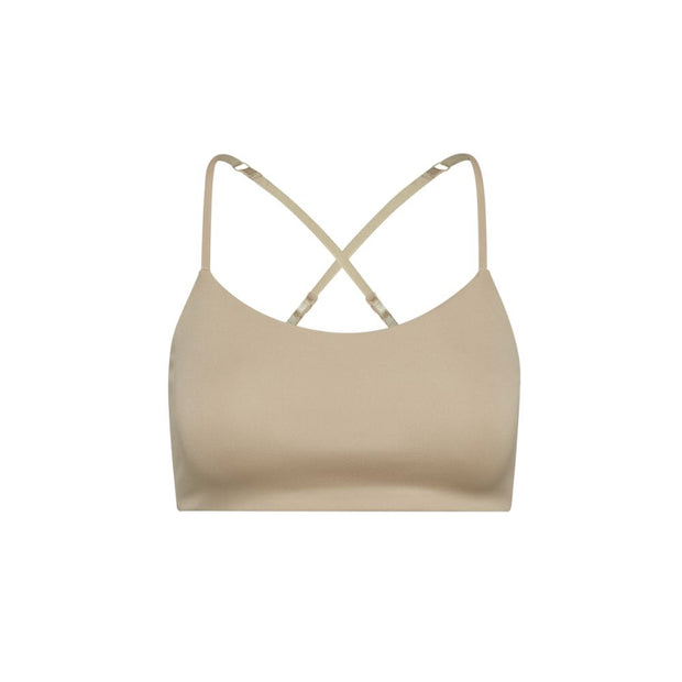 Sand-Sherbert#Close-up view beige Bleum Active Bra with crisscross straps