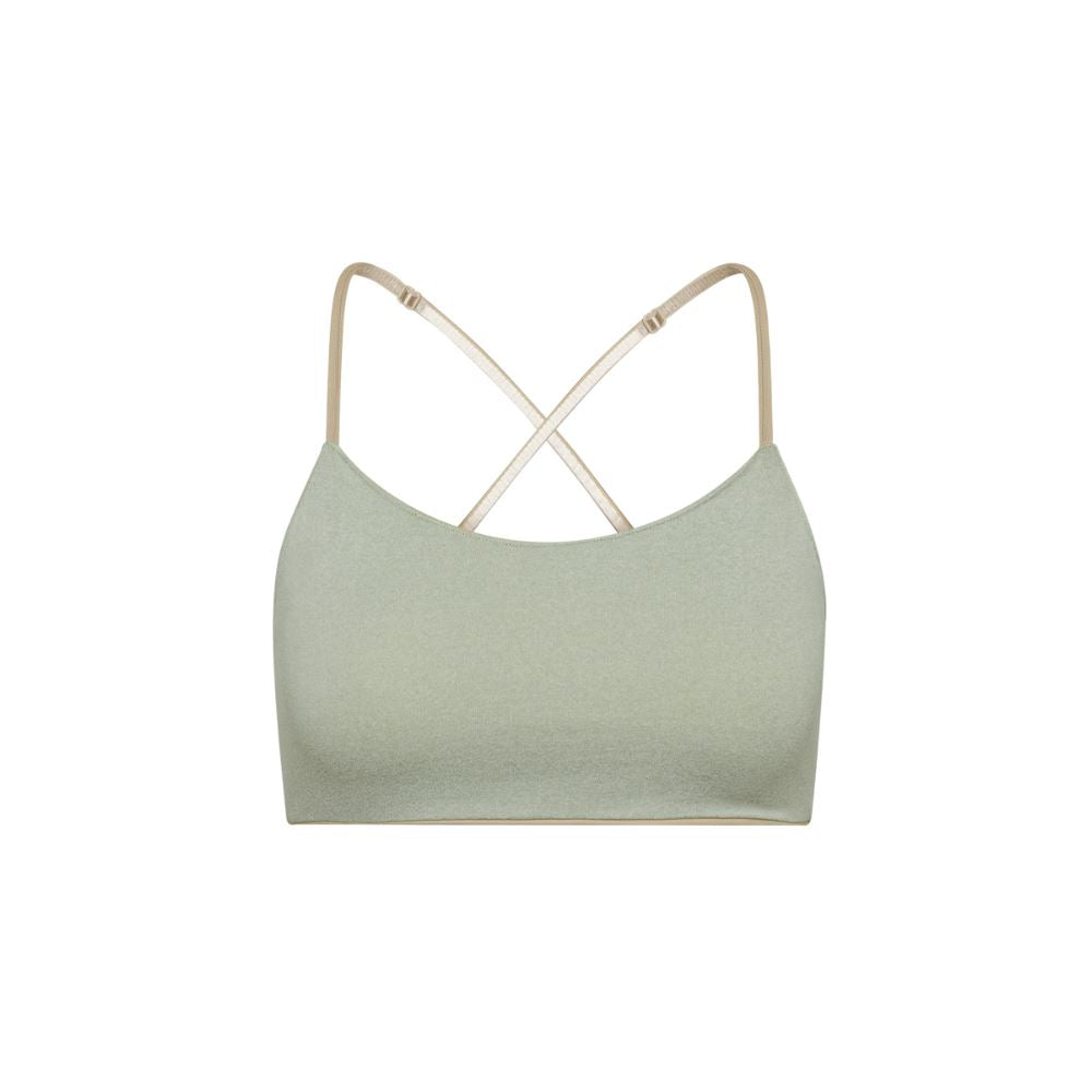 Sand-Sherbert#Close-up view green Bleum Active Bra with crisscross straps