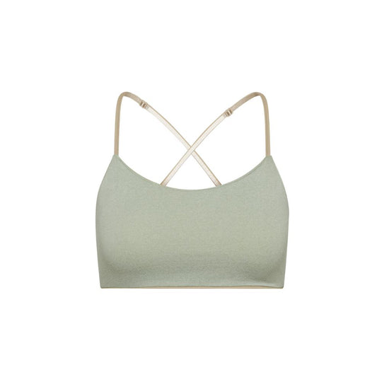 Sand-Sherbert#Close-up view green Bleum Active Bra with crisscross straps