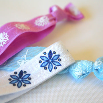 Hair ties, and pins are included in every first Bleuet order with our soft girls first bra and teen bras. 