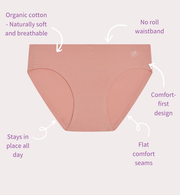 Pink teen underwear with text highlighting features on a light purple background