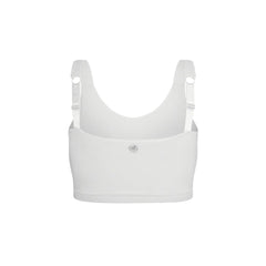 White#A white sports bra with adjustable shoulder straps and a small silver geometric logo on the center chest, shown against a plain white background.