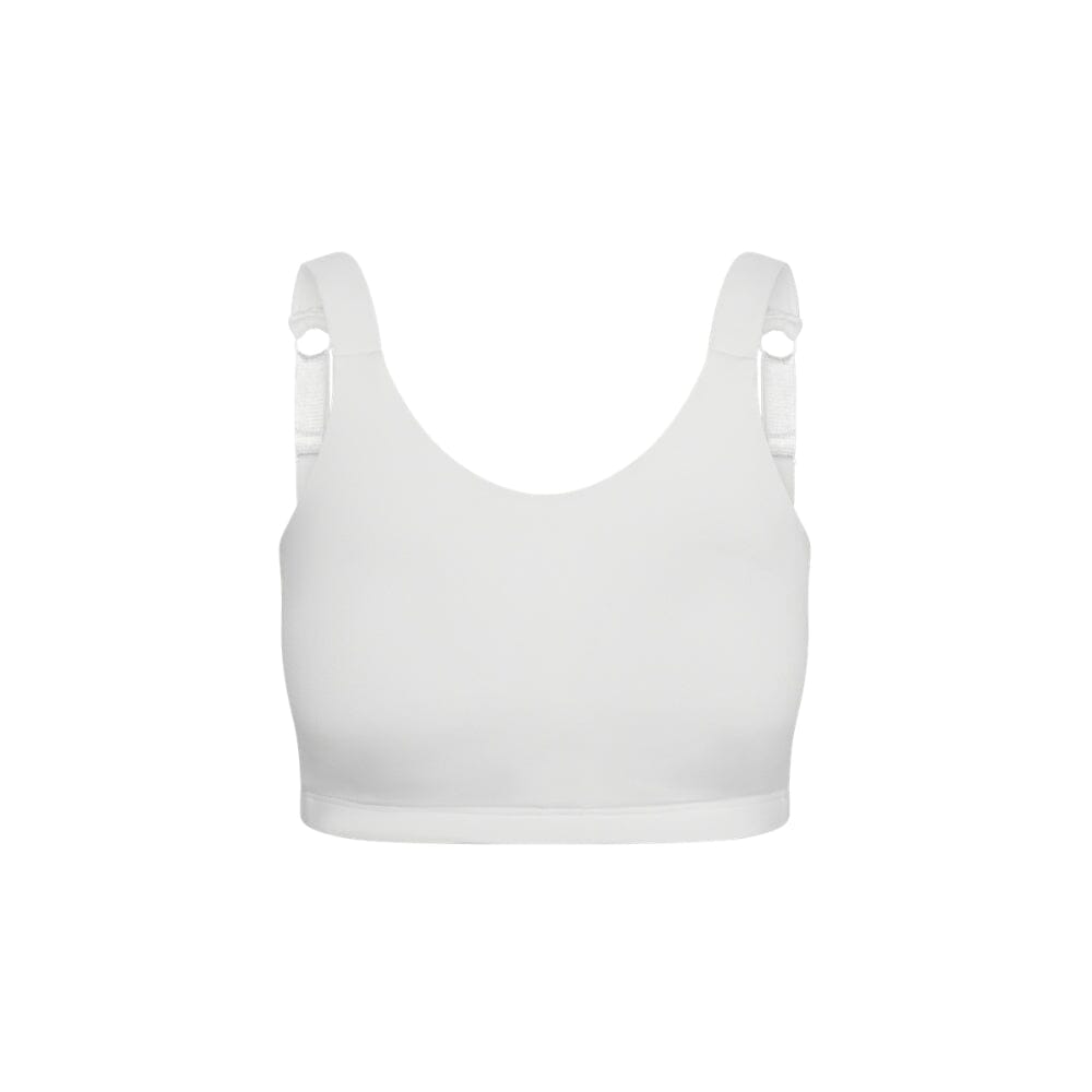A white sports bra with wide shoulder straps and adjustable side straps, shown against a plain white background.