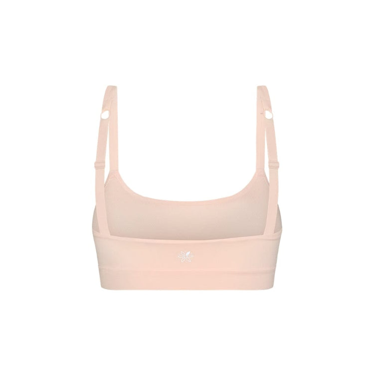 Light Ping girls sport bra on a white background from back