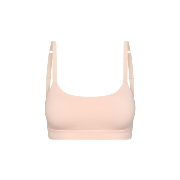 Light Ping girls sport bra on a white background