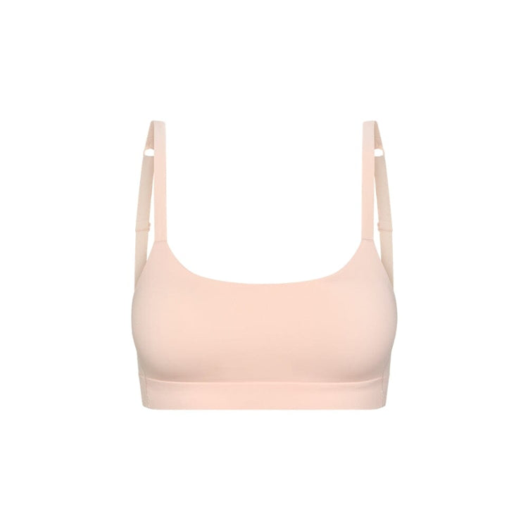 Light Ping girls sport bra on a white background