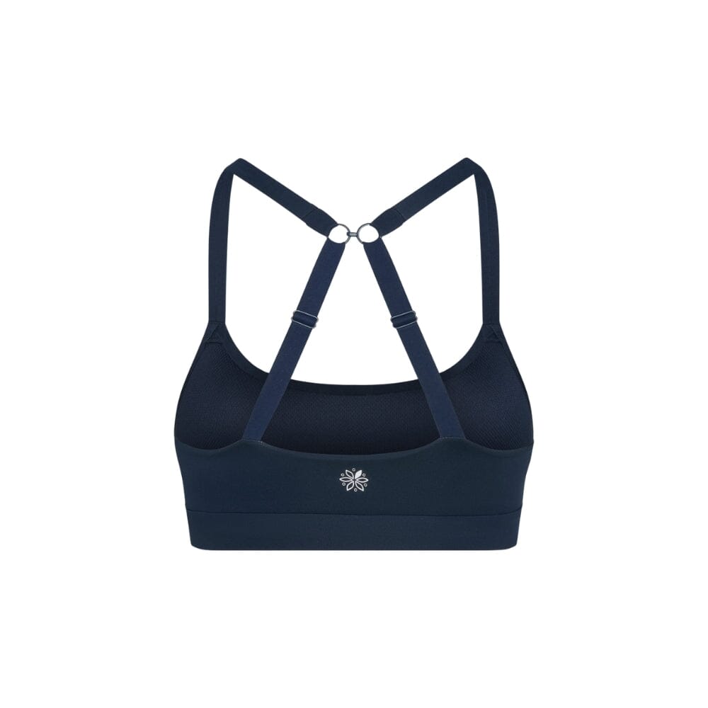 Navy#Navy teen sports bra with thin x-back straps on a white background from back