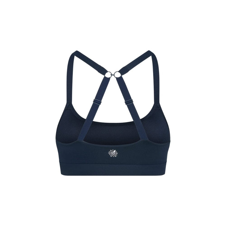Navy teen sports bra with thin x-back straps on a white background from back