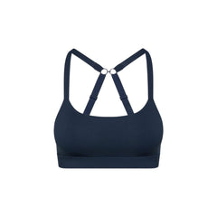 Navy#Navy teen sports bra with thin x-back straps on a white background from front