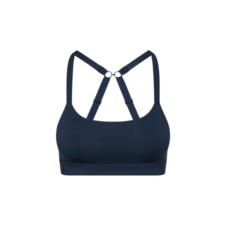 Navy teen sports bra with thin x-back straps on a white background from front