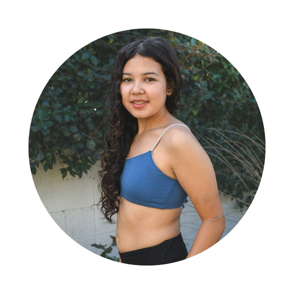 Girl wearing best padded girls bra in steel blue