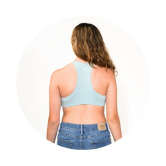 Sand-Mist#A young girl with long blonde hair, wearing a mist green racerback bra
