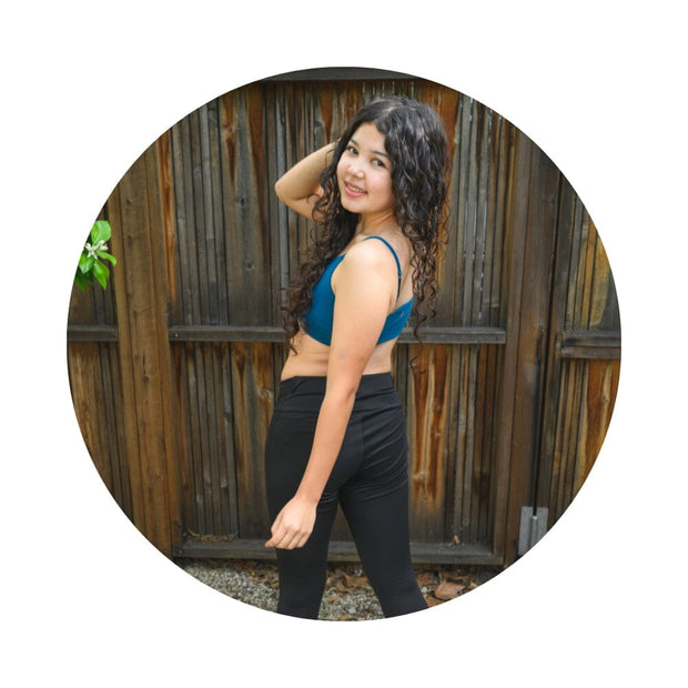 Teal#Girl in best organic girls bra in teal from side
