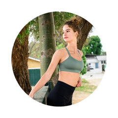Sage#Girl in best teen sports bra in sage green from side in park