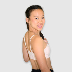 Ballet Pink#Girl Light Pink girls sport bra looking over shoulder