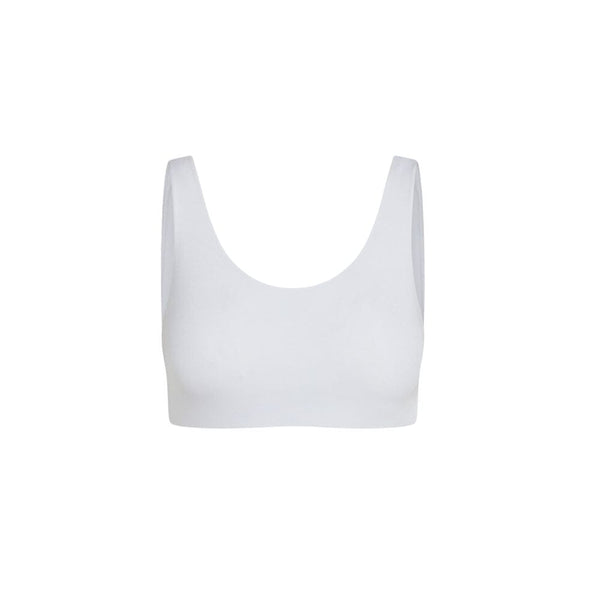 Front view of a white color aster organic tank bra.